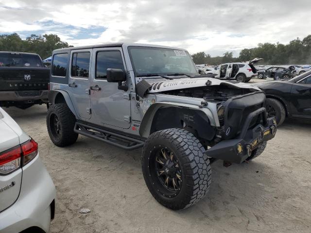 1C4BJWDG2EL218415 - 2014 JEEP WRANGLER UNLIMITED SPORT SILVER photo 4