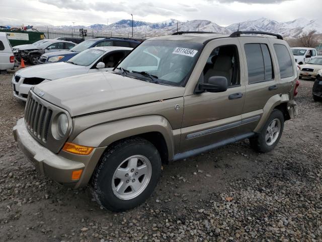 1J4GL38K45W639669 - 2005 JEEP LIBERTY RENEGADE TAN photo 1
