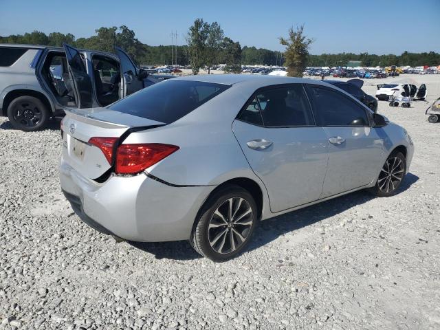 5YFBURHE4JP760604 - 2018 TOYOTA COROLLA L 银色 照片 3