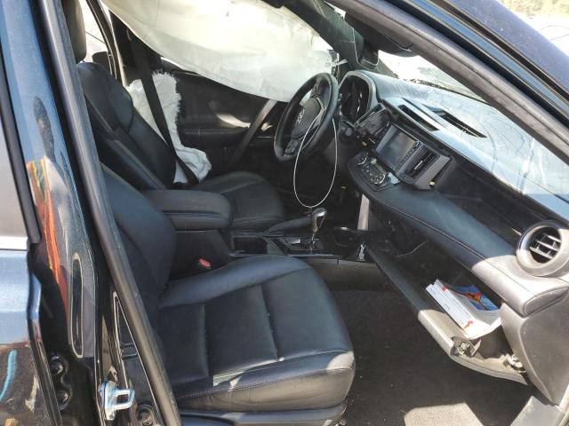 JTMNFREV2HD107309 - 2017 TOYOTA RAV4 SE BLUE photo 7