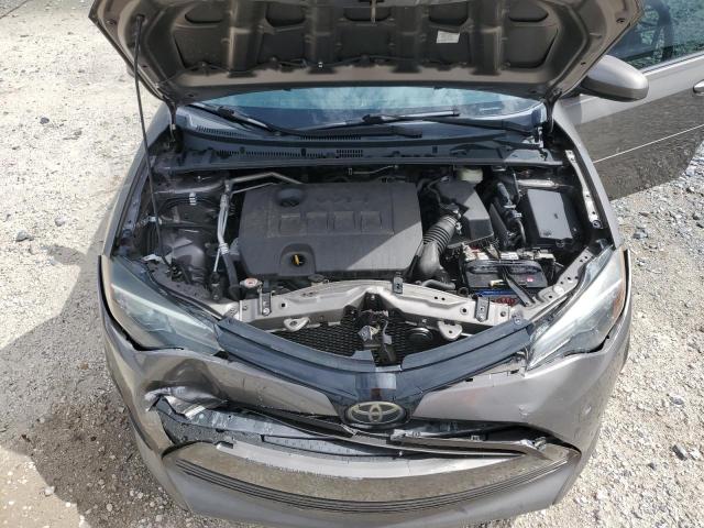 5YFBURHE3JP796669 - 2018 TOYOTA COROLLA L BROWN photo 11