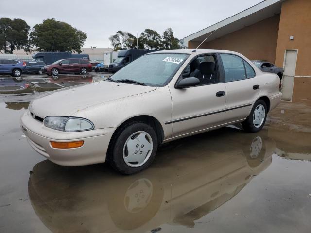 1Y1SK5380RZ037720 - 1994 CHEVROLET GEO PRIZM LSI TAN photo 1