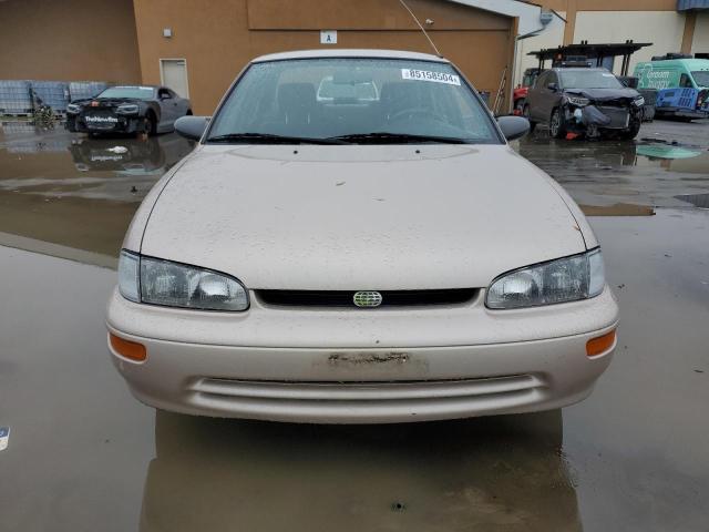 1Y1SK5380RZ037720 - 1994 CHEVROLET GEO PRIZM LSI TAN photo 5