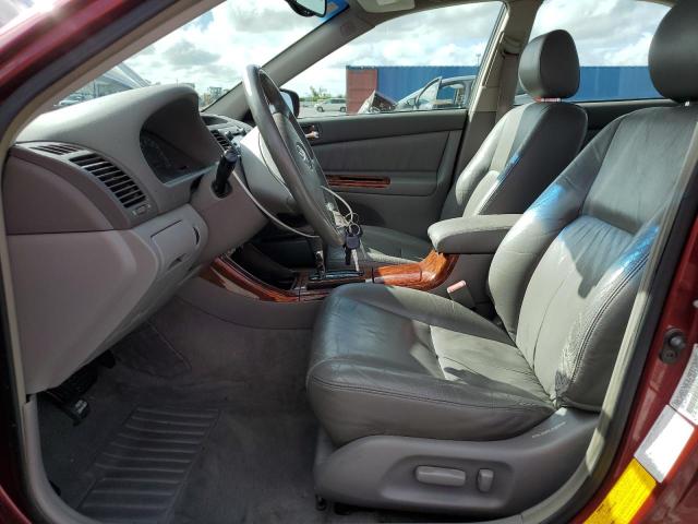 JTDBE30KX20043518 - 2002 TOYOTA CAMRY LE RED photo 7