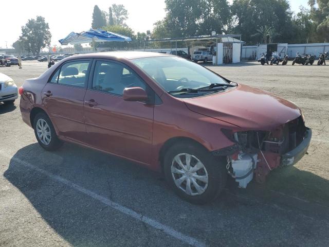 JTDBU4EE2B9155107 - 2011 TOYOTA COROLLA BASE Rot Foto 4
