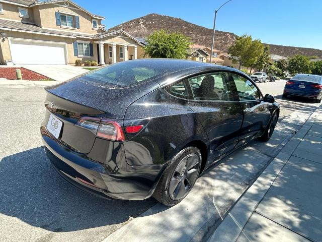 5YJ3E1EA9PF468858 - 2023 TESL MODEL 3 BLACK photo 4