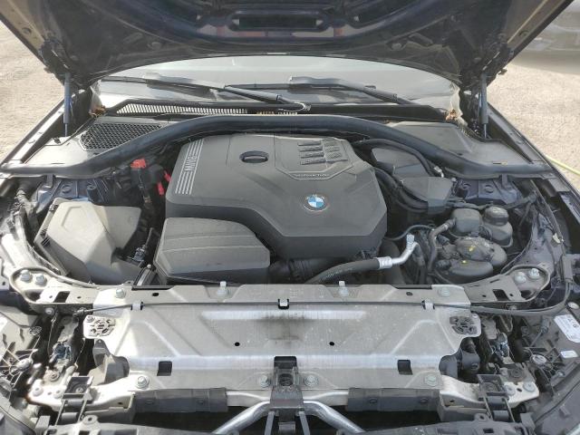 3MW89FF08P8D31232 - 2023 BMW 330 I BLUE photo 11