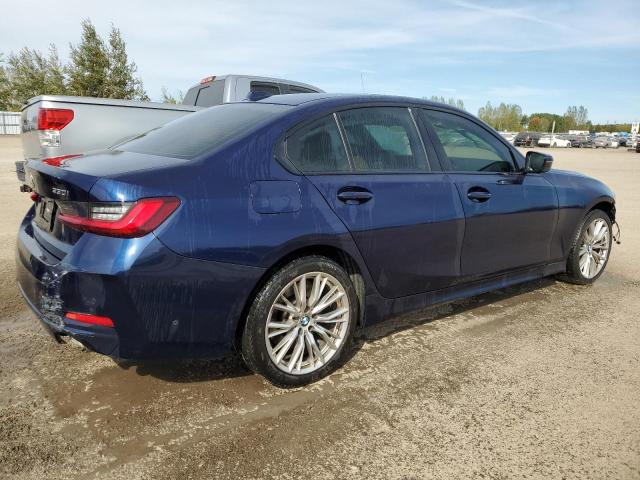 3MW89FF08P8D31232 - 2023 BMW 330 I BLUE photo 3