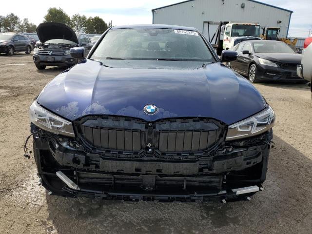 3MW89FF08P8D31232 - 2023 BMW 330 I BLUE photo 5