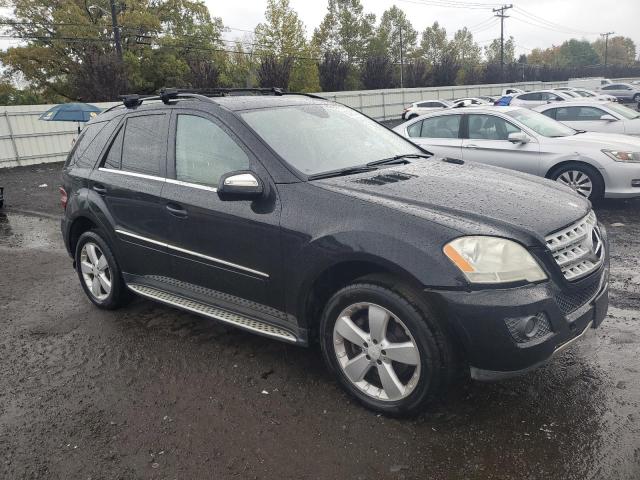 4JGBB8GB0AA615261 - 2010 MERCEDES-BENZ ML 350 4MATIC BLACK photo 4