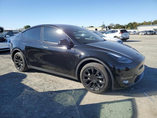 7SAYGDEE3PF907060 - 2023 TESLA MODEL Y أسود صورة 4