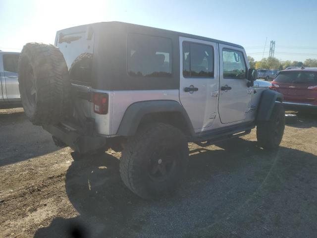 1J4BA3H13AL109809 - 2010 JEEP WRANGLER U SPORT Күміс фото 3