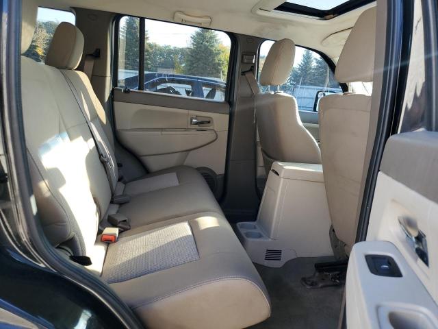 1J8GN28K99W552598 - 2009 JEEP LIBERTY SPORT შავი ფოტო 11