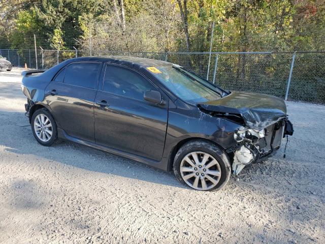 2T1BU4EE2AC319299 - 2010 TOYOTA COROLLA BASE Schwarz Foto 4