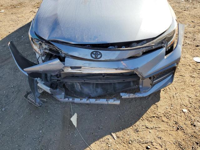 5YFM4RCE5LP022829 - 2020 TOYOTA COROLLA SE Blau Foto 12