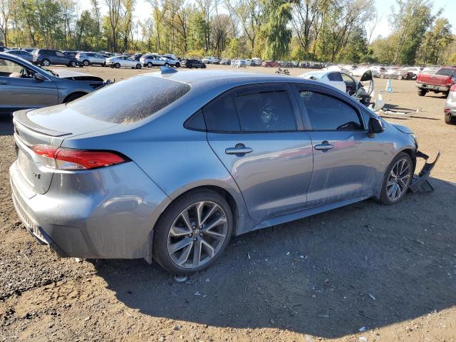 5YFM4RCE5LP022829 - 2020 TOYOTA COROLLA SE Blau Foto 3