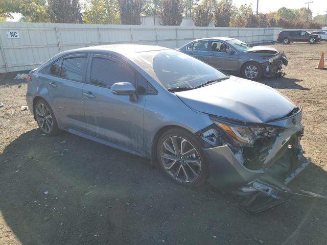 5YFM4RCE5LP022829 - 2020 TOYOTA COROLLA SE Blau Foto 4