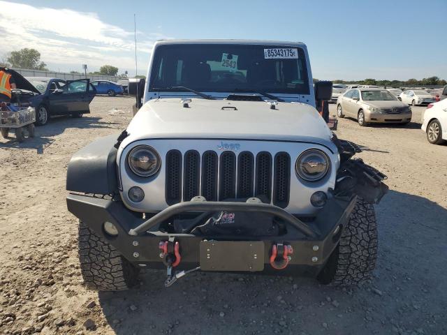 1C4BJWDG6CL281787 - 2012 JEEP WRANGLER U SPORT Сріблястий фото 5