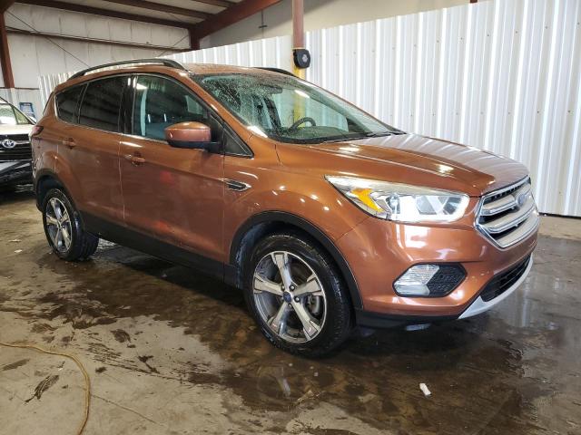 1FMCU9G93HUD48207 - 2017 FORD ESCAPE SE ORANGE photo 4