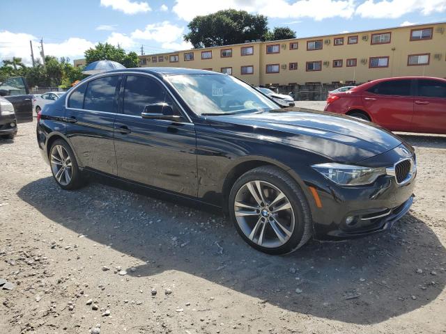 WBA8B9G57JNU95883 - 2018 BMW 330 I BLACK photo 4