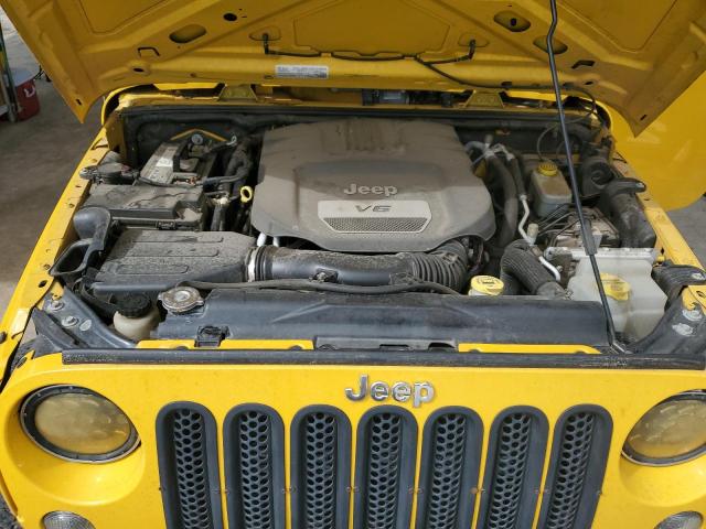 1C4BJWDG9FL622068 - 2015 JEEP WRANGLER U SPORT Gelb Foto 11