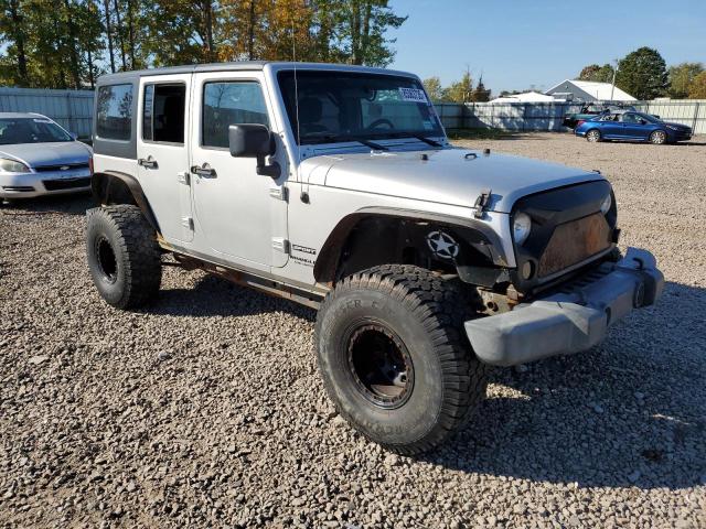 1C4BJWDG7CL226944 - 2012 JEEP WRANGLER U SPORT Մոխրագույն լուսանկար 4