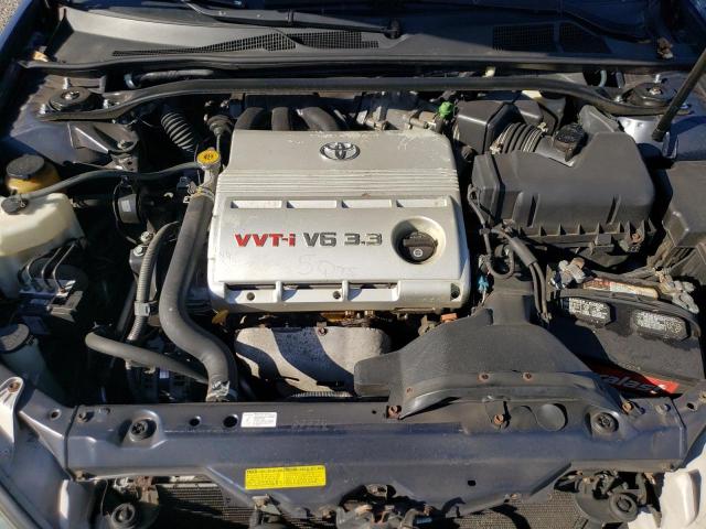 4T1BA32K44U502011 - 2004 TOYOTA CAMRY SE BLUE photo 11