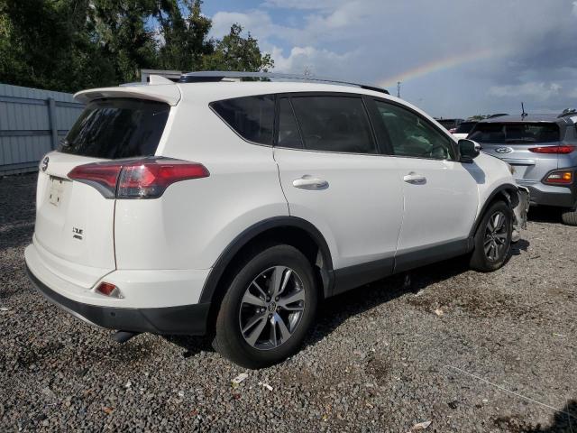 JTMRFREV3GD177014 - 2016 TOYOTA RAV4 XLE WHITE photo 3