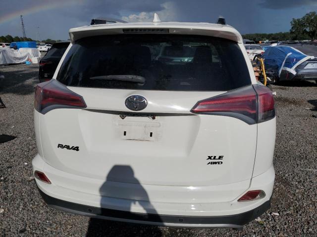 JTMRFREV3GD177014 - 2016 TOYOTA RAV4 XLE WHITE photo 6