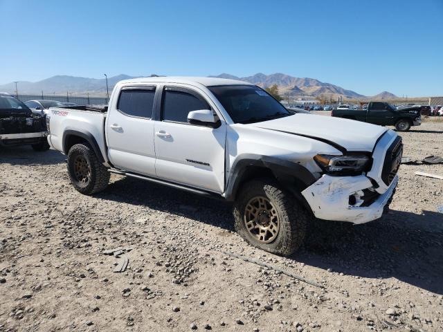 3TMCZ5AN0PM597376 - 2023 TOYOTA TACOMA DOUBLE CAB WHITE photo 4