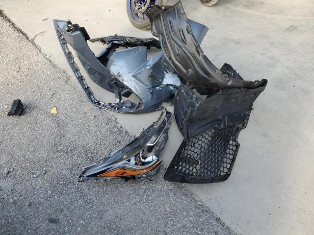 5YFEPMAE1MP228457 - 2021 TOYOTA COROLLA LE SILVER photo 12