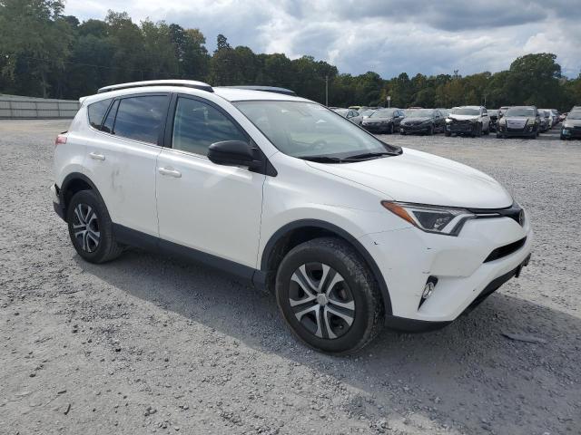 JTMZFREV6HJ721556 - 2017 TOYOTA RAV4 LE WHITE photo 4