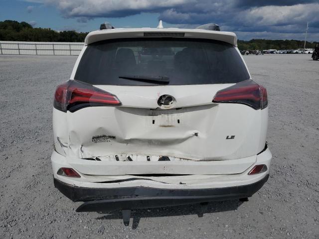 JTMZFREV6HJ721556 - 2017 TOYOTA RAV4 LE WHITE photo 6