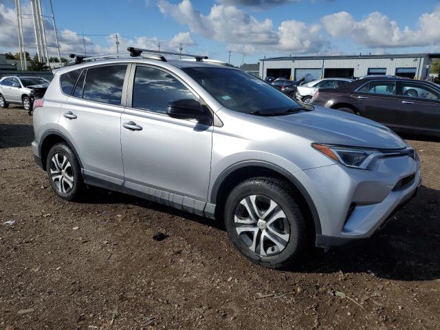 2T3BFREV1HW598560 - 2017 TOYOTA RAV4 LE SILVER photo 4