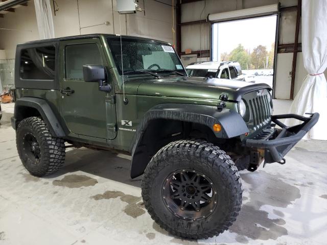 1J4FA24169L708281 - 2009 JEEP WRANGLER X GREEN photo 4