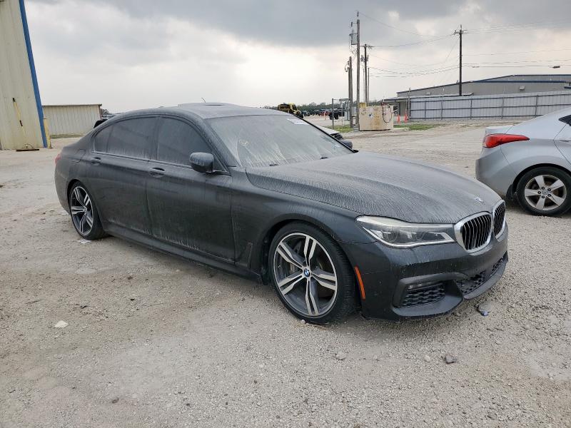 WBA7F0C50GGL99768 - 2016 BMW 750 I BLACK photo 4