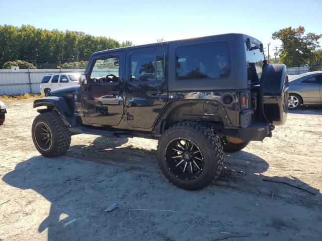1C4BJWEG0GL103944 - 2016 JEEP WRANGLER U SAHARA Schwarz Foto 2