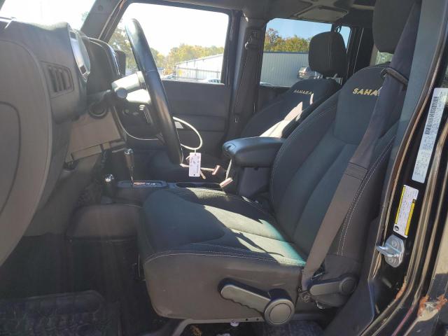 1C4BJWEG0GL103944 - 2016 JEEP WRANGLER U SAHARA Schwarz Foto 7
