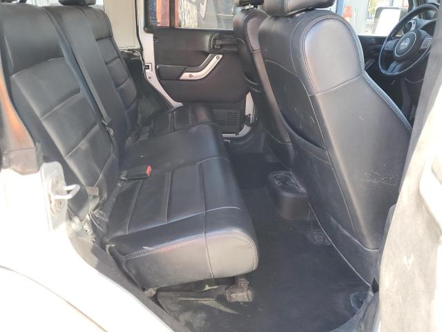 1C4BJWEG6CL228277 - 2012 JEEP WRANGLER U SAHARA SILVER photo 10