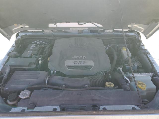 1C4BJWEG6CL228277 - 2012 JEEP WRANGLER U SAHARA SILVER photo 11