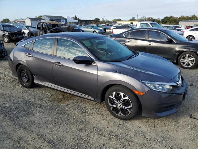 2HGFC2F50JH510069 - 2018 HONDA CIVIC LX ნაცრისფერი ფოტო 4