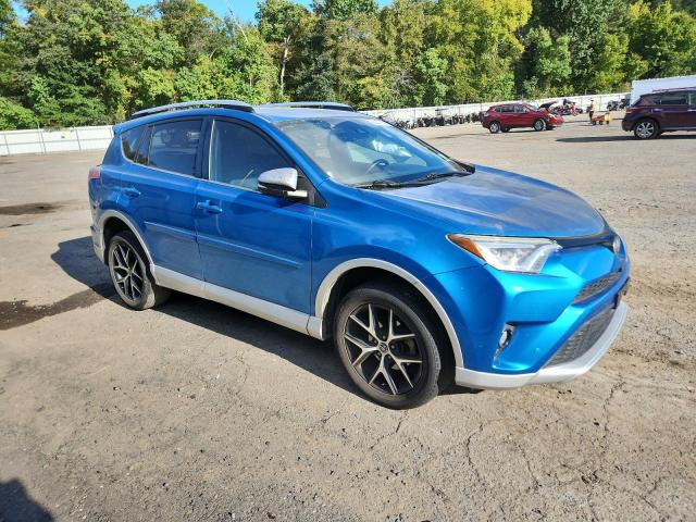JTMNFREVXGJ074849 - 2016 TOYOTA RAV4 SE BLUE photo 4