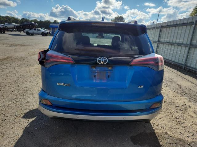 JTMNFREVXGJ074849 - 2016 TOYOTA RAV4 SE BLUE photo 6