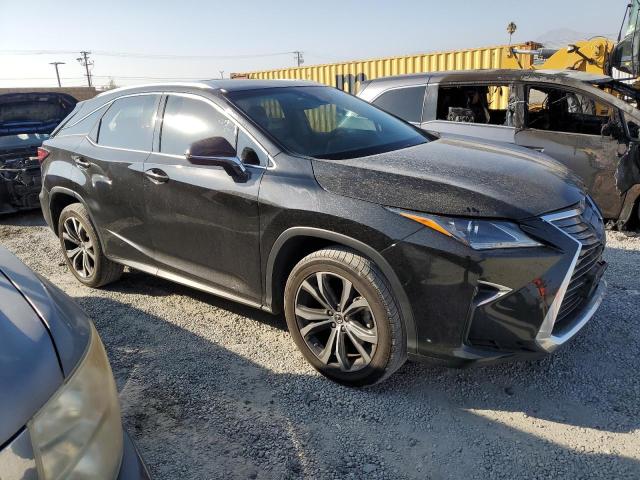 2T2ZZMCA0KC147559 - 2019 LEXUS RX 350 BASE BLACK photo 4
