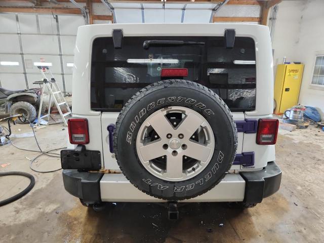 1J4BA5H19BL557873 - 2011 JEEP WRANGLER U SAHARA თეთრი ფოტო 6