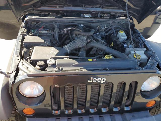 1J4AA2D13AL210831 - 2010 JEEP WRANGLER SPORT BLACK photo 11