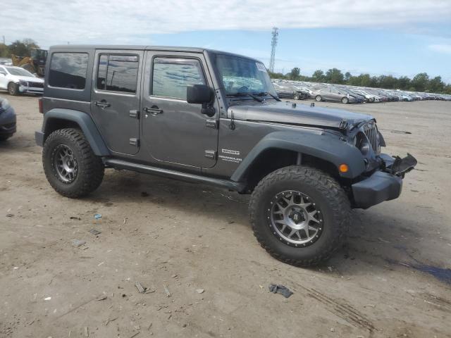 1C4BJWDG7HL664385 - 2017 JEEP WRANGLER UNLIMITED SPORT GRAY photo 4