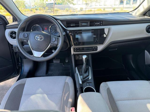 2T1BURHE8KC222442 - 2019 TOYOTA COROLLA L Blau Foto 9