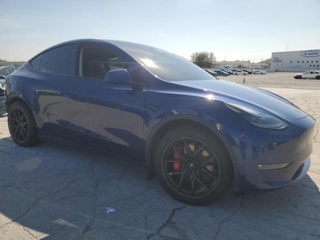 7SAYGDEF0PF697106 - 2023 TESLA MODEL Y Կապույտ լուսանկար 4