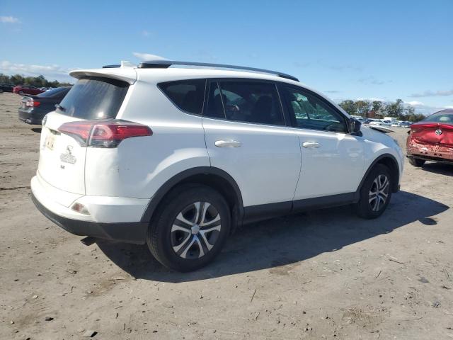 JTMZFREV4HJ130819 - 2017 TOYOTA RAV4 LE WHITE photo 3